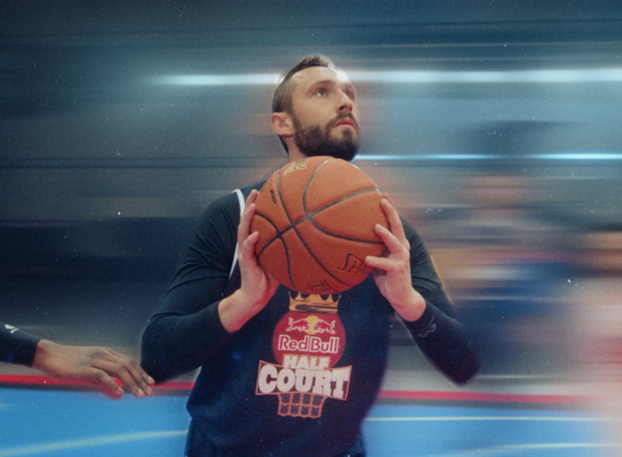 Basketball player lining up a shot during a Red Bull 3x3 basketball training film